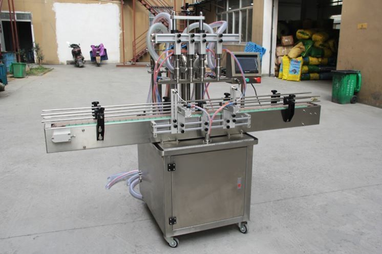 Neues Design Halbautomatische Öl / Saft / Wasser / Honig Flüssigkeit Glasdose Plastikflasche Füllung Verpackungsmaschine