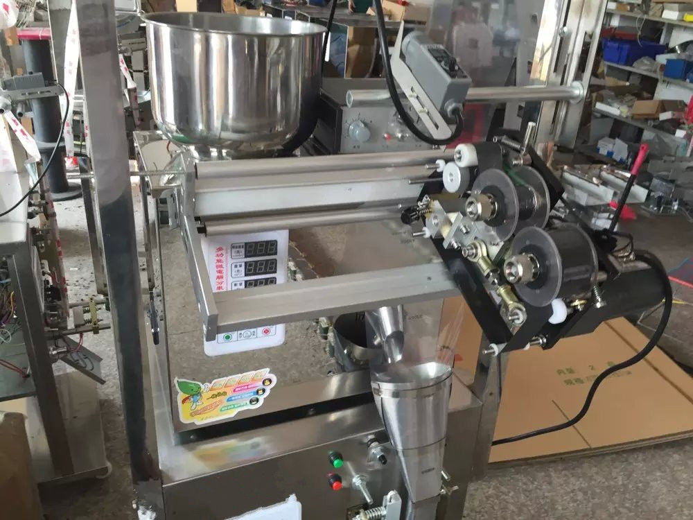 Halbautomatische elektrische Teebeutelverpackungsmaschine aus Edelstahl und Pulver, gefüllt mit zuverlässigen Motorkernkomponenten